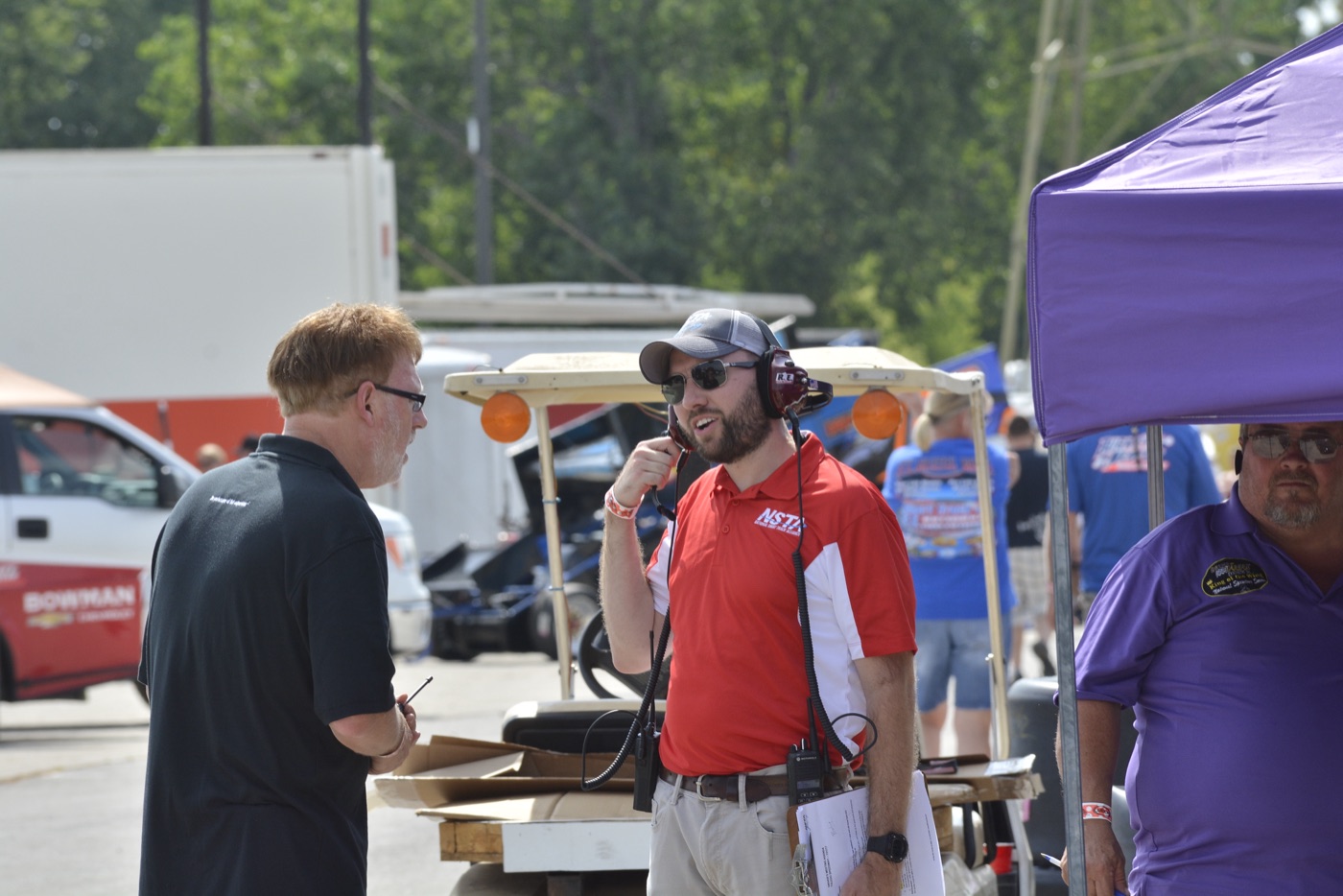 John Robbins working as a race director at the track